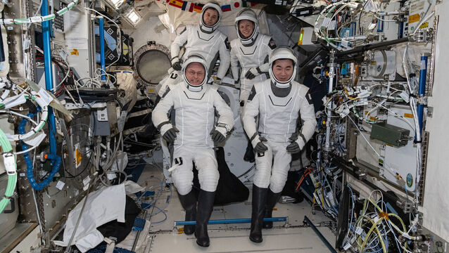 <p>Four crew members were returned to Earth (Nasa via AP)</p>