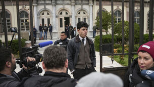 <p>Sean Binder stands outside a court in Mytilene port, on the island of Lesbos, Greece. File picture: AP Photo/Panagiotis Balaskas</p>