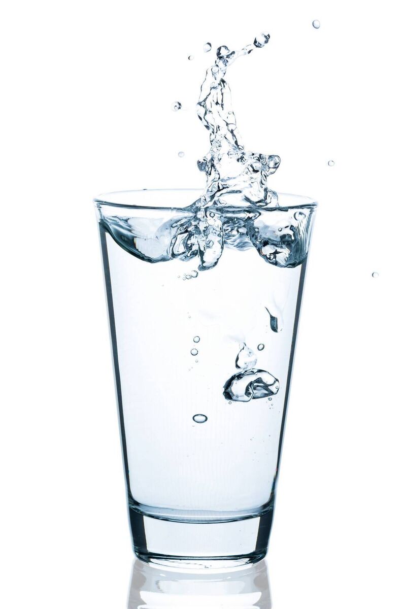Drinking a full glass of water is a good way to start the day. Picture: iStock