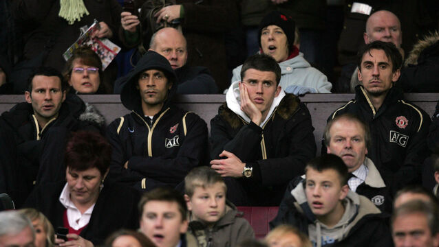 <p>Gary Neville (right) says Michael Carrick’s role cannot continue after this season (Martin Rickett/PA)</p>