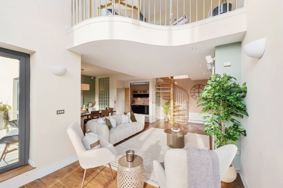 View of Luxury penthouse apartment keys resting on marble countertop with ...