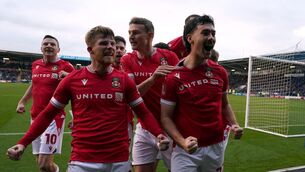 <p>Wrexham's Thomas O'Connor (no.22) celebrates scoring their side's first goal of the game with team-mates during the Emirates FA Cup Third Round match at The Croud Meadow, Shrewsbury. Picture date: Sunday January 7, 2024. PA Photo. See PA story SOCCER Shrewsbury. Photo credit should read: Nick Potts/PA Wire.</p>