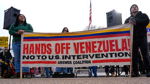 <p>Protesters rally outside the White House in Washington, after the US captured Venezuelan President Nicolás Maduro and his wife in a military operation. Picture: Julia Demaree Nikhinson/AP</p>