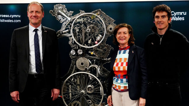 <p>First Minister of Wales Eluned Morgan (centre), Tour de France 2018 winner Geraint Thomas (right), and director of the Tour de France Christian Prudhomme. Picture: Zoe Head-Thomas/PA</p>