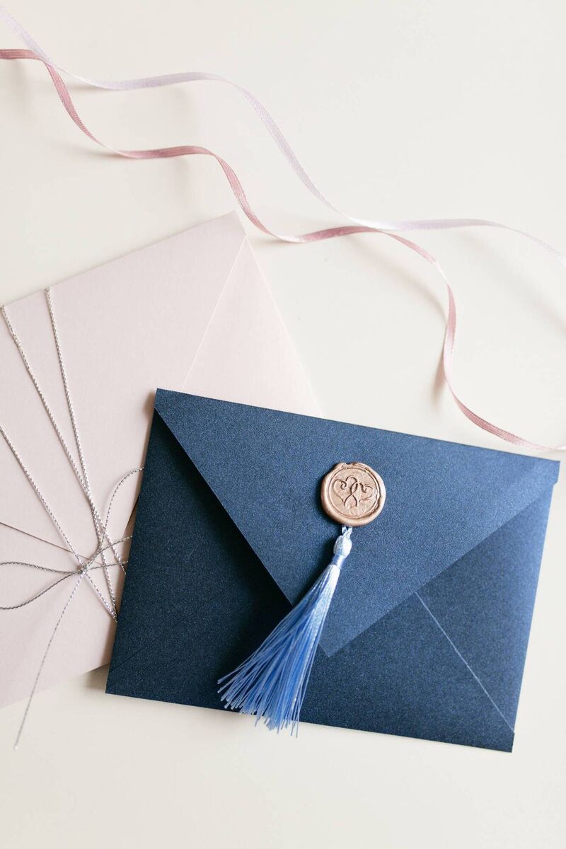 You can embrace the tassel trend with your wedding invitations and more