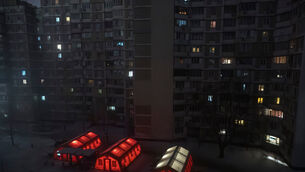 Emergency tents have been set up in a residential neighbourhoods to allow people to get warm (Vladyslav Musiienko/AP)