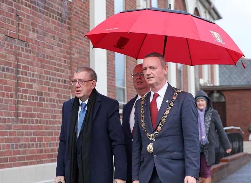  Councillor Tony Fitzgerald, Finbarr Archer, and Lord Mayor Fergal Dennehy arriving at the Our Lady of Lourdes church, Ballinlough, for Seán Ó Sé's funeral. Picture: Jim Coughlan