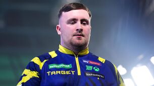 <p>Luke Littler, pictured, crashed out of the Bahrain Masters after defeat to Gerwyn Price (John Walton/PA)</p>