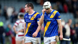 <p>Loughrea’s Cullen Killeen is consoled by Caimin Killeen after the semi-final. Pic: INPHO/Ryan Byrne</p>