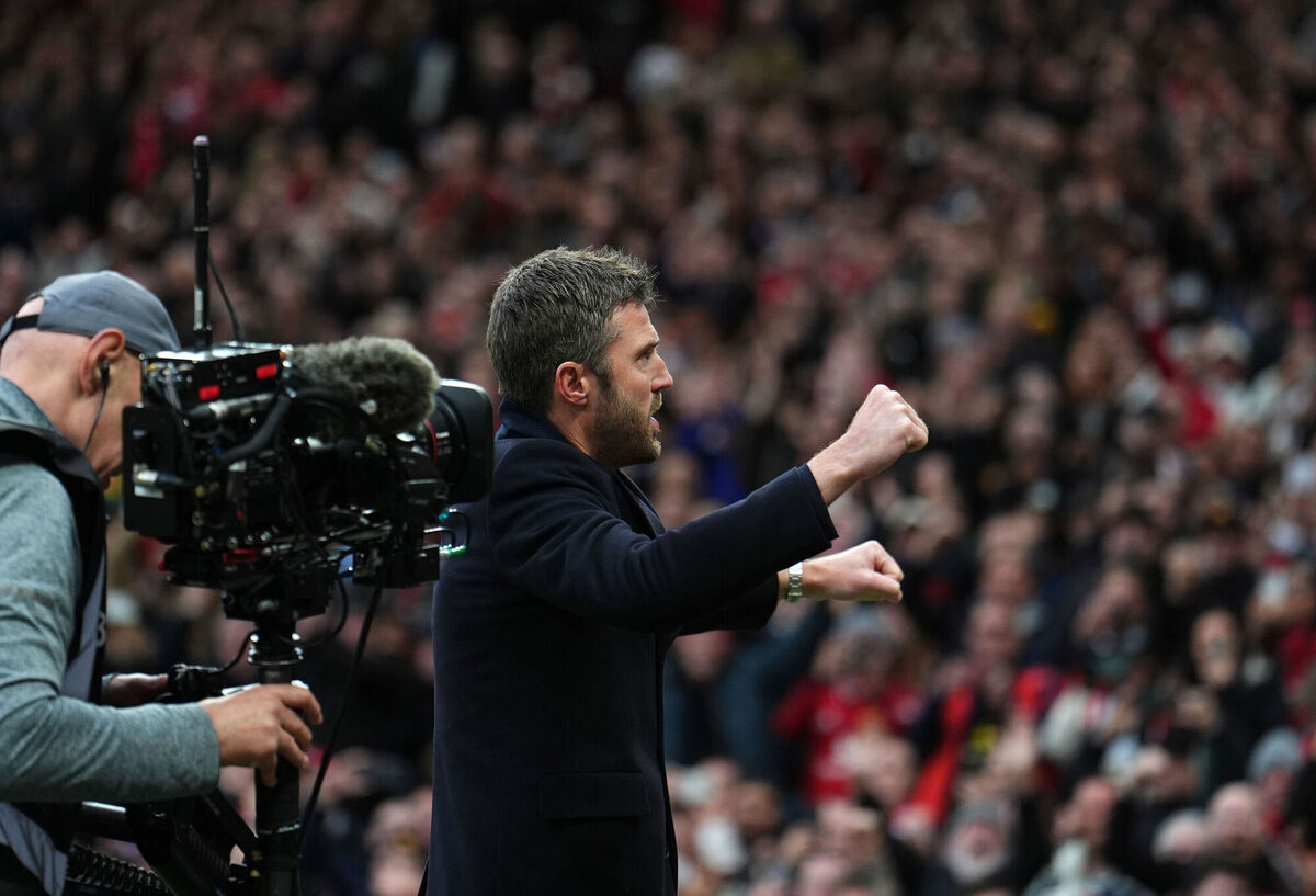 Manchester United interim head coach Michael Carrick salutes the fans. Pic: Martin Rickett/PA Wire.