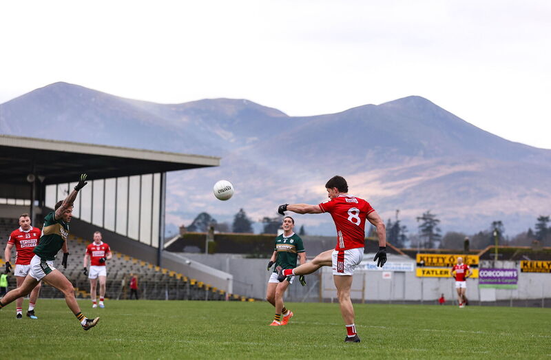 Colm O'Callaghan of Cork kick's a point. Pic: Michael P Ryan/Sportsfile