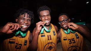 <p>HARDWARE: Titans' Fortune Igbokwe , Michael Smyth and Nathan Gbinigie celebrate winning. Pic: INPHO/Tom Maher</p>