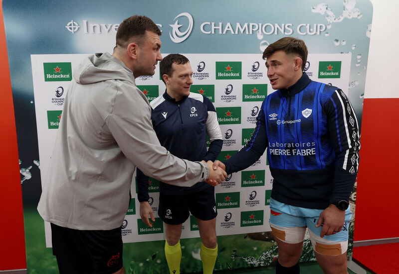 Munster's Tadhg Beirne with Referee Matthew Carley and Castres Olympique’s Baptiste Delaporte at the coin toss. Pic: Dan Sheridan/Inpho