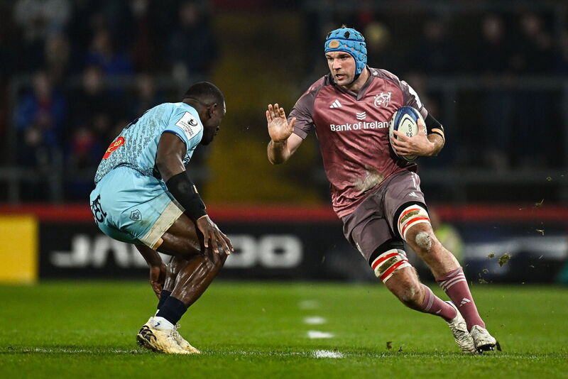 Tadhg Beirne of Munster in action against Christian Ambadiang of Castres Olympique. Pic: Seb Daly/Sportsfile