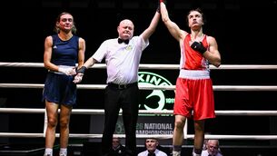<p>LOOKING UP: Kellie Harrington of St Mary’s BC Tallaght is declared victorious over Kellie McLoughlin of St Catherine’s BC Dublin in their 60kg final bout at the National Stadium in Dublin. Pic: David Fitzgerald/Sportsfile</p>