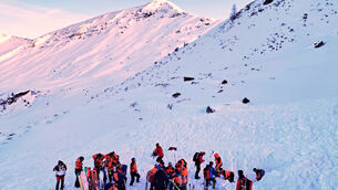 Rescuers search for people after an avalanche in the Salzburg Pongau region (Bergrettung Pongau/AP)