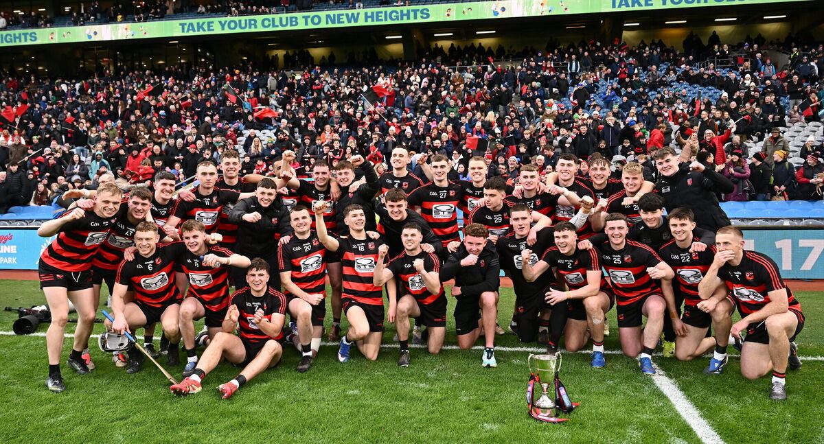 Ballygunner players celebrate with the Tommy Moore Cup. Pic: Piaras Ó Mídheach/Sportsfile