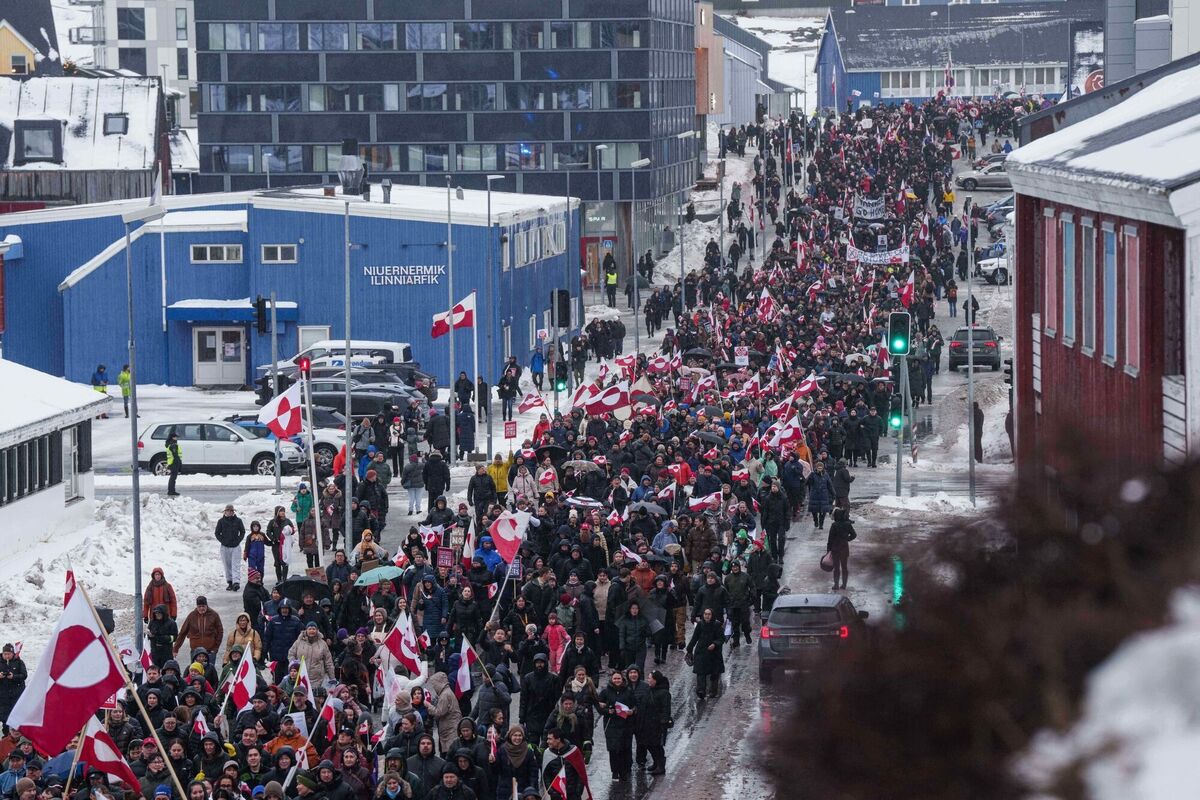 A protest rally marching to the US consulate in Nuuk, Greenland, on Saturday to protest against US president Donald Trump's threat to take over the island. Picture: Evgeniy Maloletka/AP 