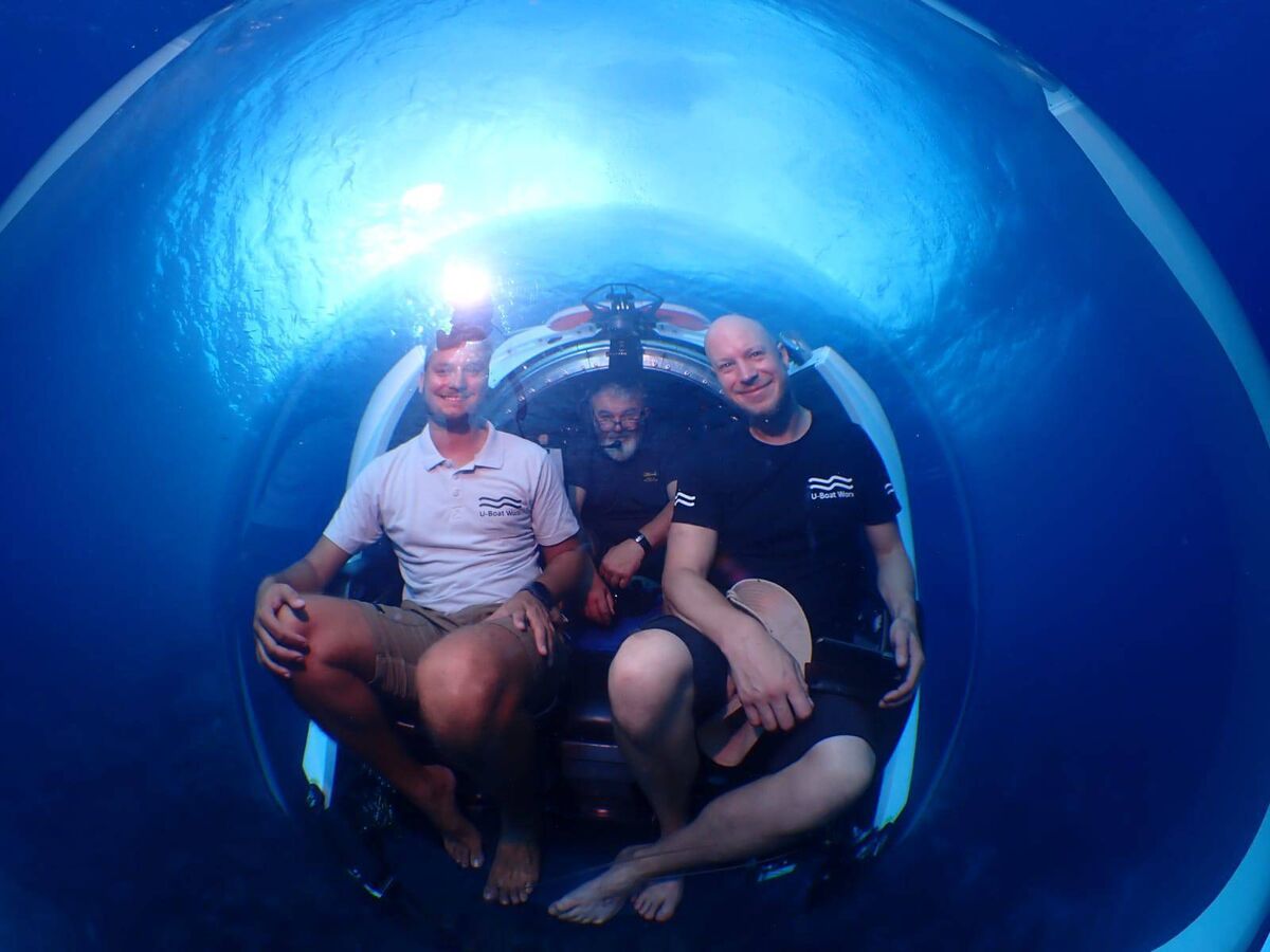 A file photo for John Kearney, centre, with technicians from Dutch submarine manufacturers U-Boat Worx on board the first sub, an A-EX1, that the West-Cork based diver acquired in 2024. 