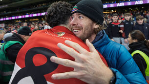 <p>Dingle’s Mark O’Connor celebrates with former AFL team mate Cameron Guthrie. Pic: INPHO/James Crombie</p>