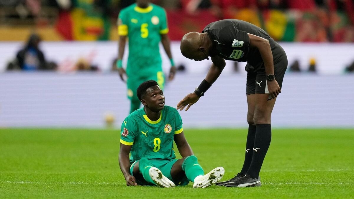 Senegal win AFCON title after players walk off in protest at late Morocco penalty in final