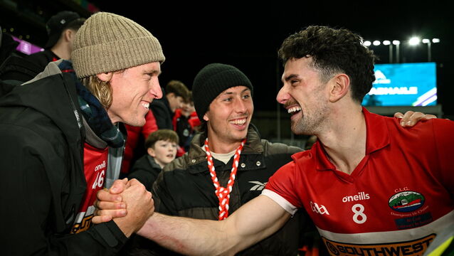 <p>Mark O'Connor of Dingle is congratulated by Geelong teammates Mark Blicavs and Jack Henry. Pic: Ray McManus/Sportsfile</p>