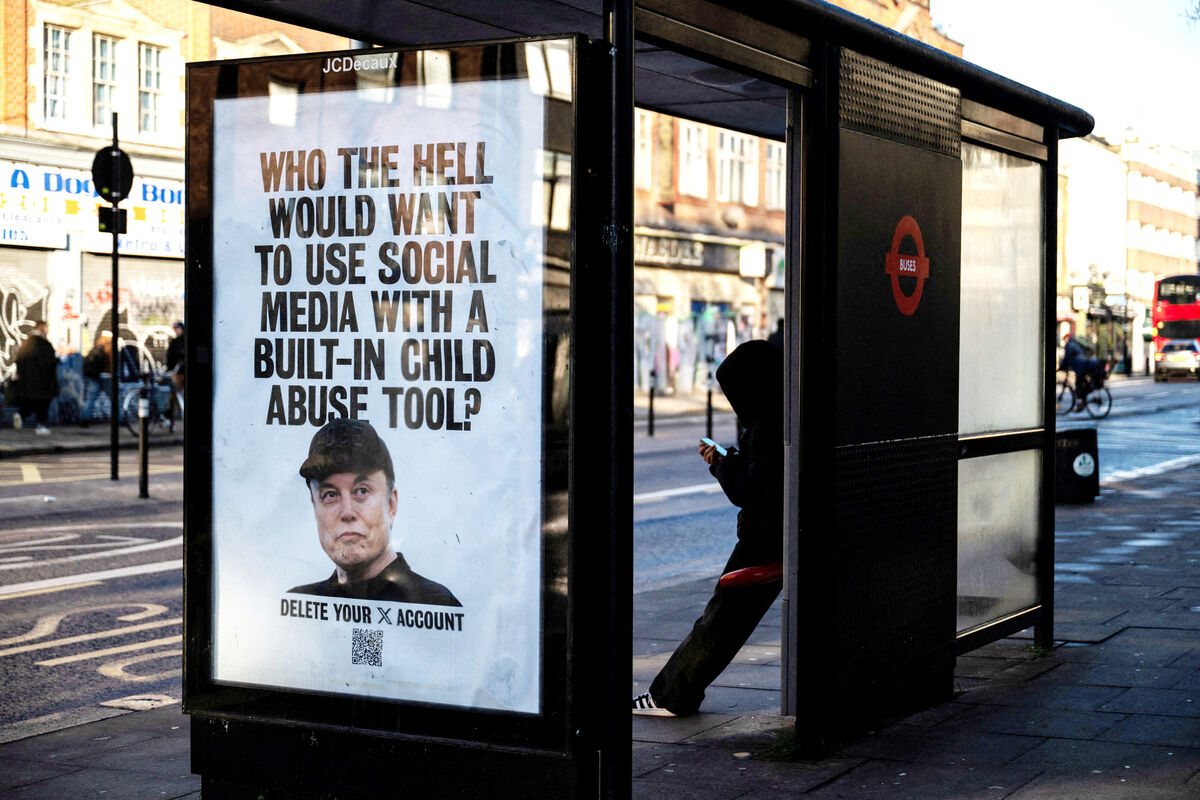 A protest group's poster in London calling for a boycott of Elon Musk's social media platform X (formerly Twitter) referring to its Grok AI tool which allows users to create non-consensual 'nudified' images from photos of real people, including children. Picture: Chris J Ratcliffe/Reuters A protest group's poster in London calling for a boycott of Elon Musk's social media platform X (formerly Twitter) referring to its Grok AI tool which allows users to create non-consensual 'nudified' images from photos of real people, including children. Picture: Chris J Ratcliffe/Reuters
