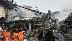 At least 60 people were reported missing (AP)