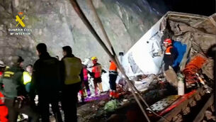 <p>Rescue workers at the scene after the high-speed train collision,in Adamuz, Spain. Picture: Guardia Civil screenshot via AP</p>