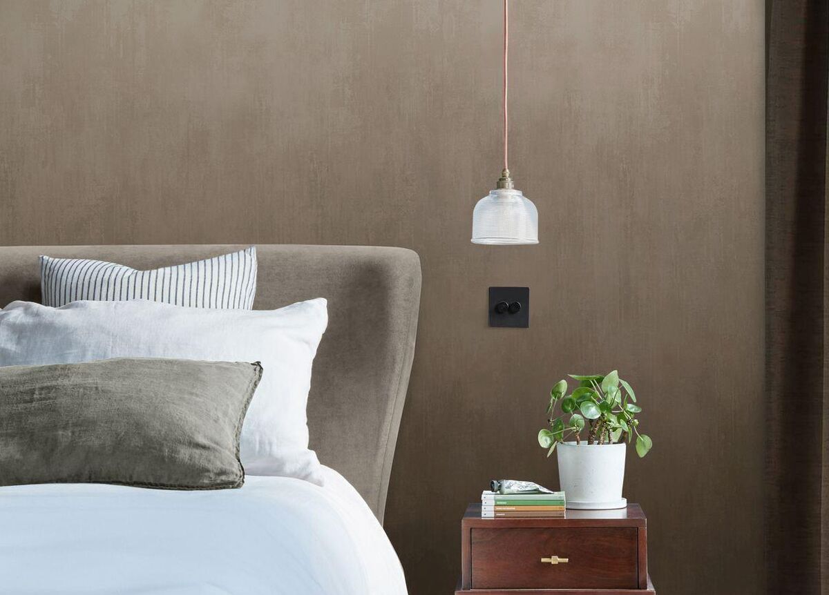  Where a busy patterned wallpaper would overwhelm, the simple design of the Oblique ink bespoke mural is one for a small space; €46 per metre, Graham &amp; Brown.