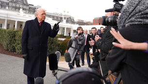 <p>President Donald Trump takes questions from reporters before departing on Marine One from the South Lawn of the White House, Friday, Jan. 16, 2026, in Washington. (AP Photo/Evan Vucci)</p>