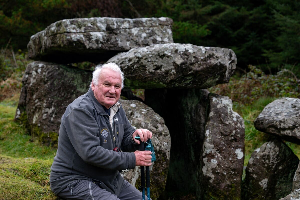 Mike Moroney at one of the ancient dolmens along the trail. Picture Chani Anderson Mike Moroney at one of the ancient dolmens along the trail. Picture Chani Anderson