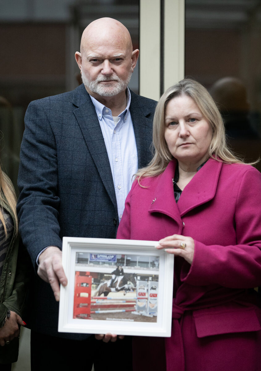 Parents of Bryonny Sainsbury, Chris and Alison Sainsbury with a photo of her outside the Coroners Court in 2024 after an inquest into her death. The apology from Midland Regional Hospital was read to the High Court as the family of Bryonny Sainsbury settled five actions against the HSE. File photo: Gareth Chaney/Collins