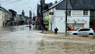 <p>Flooding in Midleton, Co Cork, in October 2023. It was reported that 27% of all properties in the town which need flood barriers have had them installed to date. File picture</p>