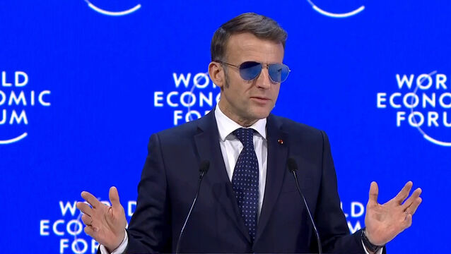 French President Emmanuel Macron wore sunglasses during his speech in Davos World Economic Forum/PA)