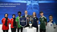 Gareth Bale with representatives from the host countries, including Ade Solanke 10/10/2023