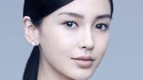 Husband defends Chinese actress wife by telling reporters she looks ugly
