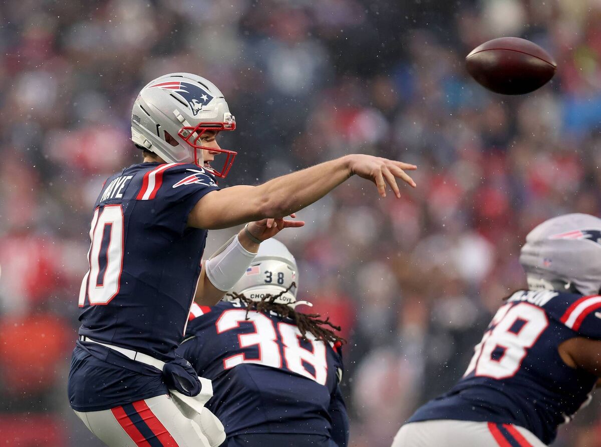 Drake Maye of the New England Patriots passes the ball in the first quarter during the AFC Divisional Playoff game against the Houston Texans at Gillette Stadium on January 18, 2026 in Foxborough, Massachusetts. (Photo by Elsa/Getty Images)