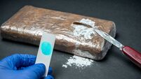 iStock-2161225792 (1).jpg Positive cocaine test result in seized drug package from police trafficking operation.