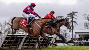 <p>JJ Slevin on board Home By The Lee (red silks) wins ahead of Danny Gilligan on board Staffordshire Knot. Pic ©INPHO/Morgan Treacy</p> <p>JJ Slevin on board Home By The Lee (red silks) wins ahead of Danny Gilligan on board Staffordshire Knot. Pic ©INPHO/Morgan Treacy</p>