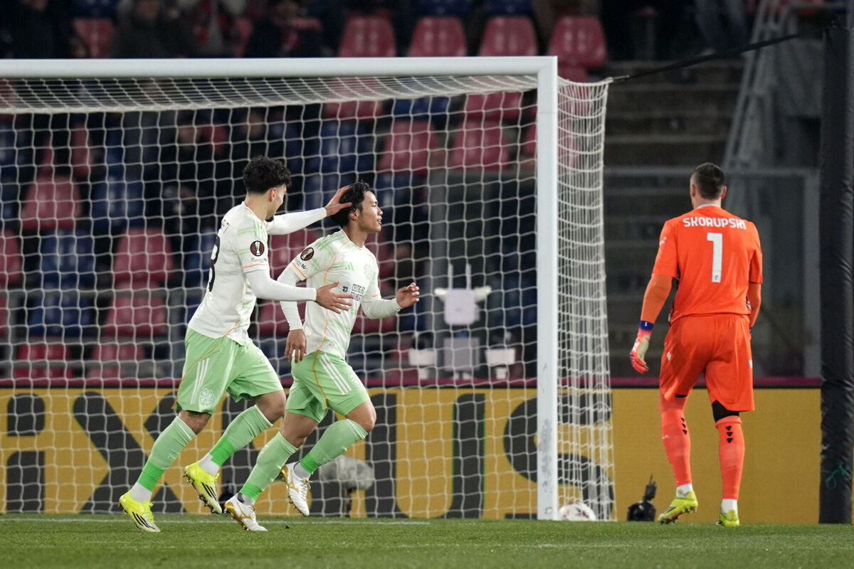 Celtic's Reo Hatate, center, celebrates scoring. Pic: Massimo Paolone/AP Celtic's Reo Hatate, center, celebrates scoring. Pic: Massimo Paolone/AP
