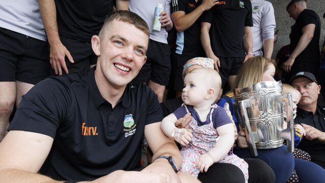 <p>10-month-old Iseult Shelly with Ronan Maher, captain of the Tipperary All-Ireland senior hurling champions. Picture: Andres Poveda</p>