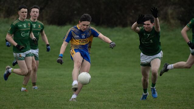 <p>Michael Horan of Presentation Milltown (Blue) is closed down by Rory O'Connor of St Pats Castleisland (Green). Pic: Domnick Walsh/Eye Focus</p>