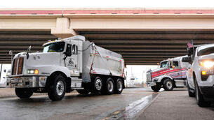 <p>Workers have been preparing for bad weather (AP)</p>