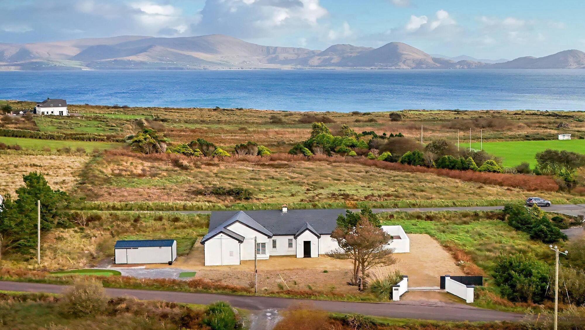 A €525k coastal Kerry bungalow with sea views, vaulted ceilings and a putting green