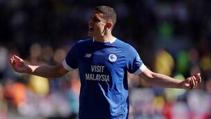<p>Cardiff's Yousef Salech was stretchered off wearing a neck brace after a collision with Stockport County centre-back Brad Hills. Pic: Ryan Hiscott/Getty Images</p>