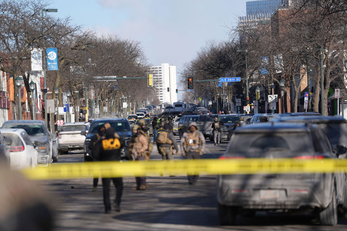 Federal agents stand near the site of a shooting Saturday, Jan. 24, 2026, in Minneapolis. (AP Photo/Abbie Parr) Federal agents stand near the site of a shooting Saturday, Jan. 24, 2026, in Minneapolis. (AP Photo/Abbie Parr)