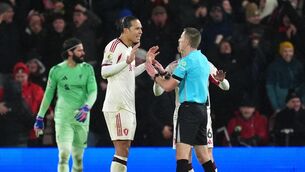 <p>Liverpool's Virgil van Dijk protests to referee Michael Salisbury after Bournemouth score late at the Vitality Stadium. Pic: Adam Davy/PA</p>