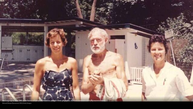 <p>Ernest Hemingway in June 1961 at the home of a Mayo Clinic doctor with two members of the doctor's family. He hardly exists and — at 61 years of age — looks so fragile and shrunken, he could be two decades older.</p>