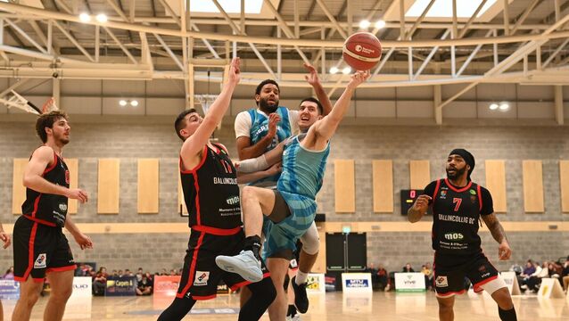 <p>A shot by Cian Heaphy, Energywise Neptune is blocked by Ciarán O'Sullivan, Ballincollig in the Domino's Mens Superleague basketball game at MTU on Saturday. Pic: Larry Cummins</p>
